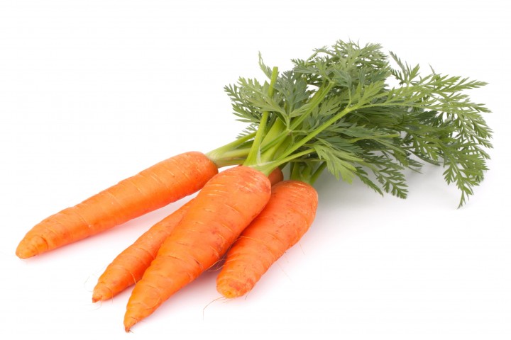 carrot vegetable with leaves isolated on white background cutout