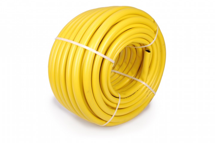 garden water hose rolled up in a tangle isolated on white