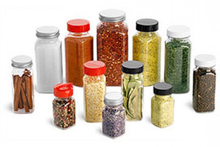 different spices in cellophane package isolated on white