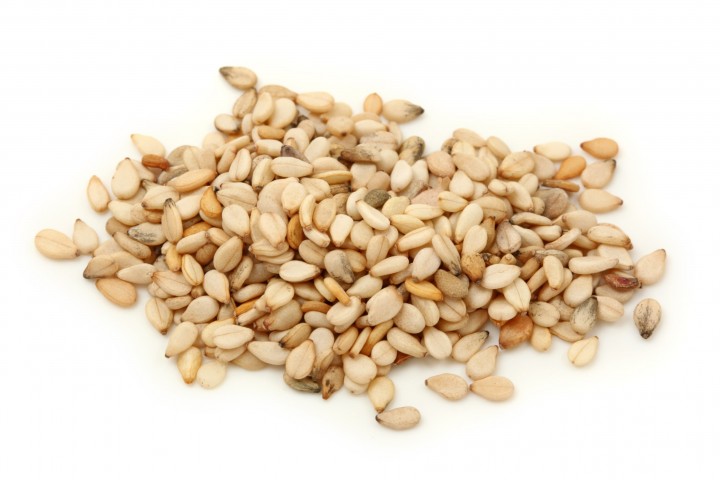 sesame seeds isolated on white background macro shot