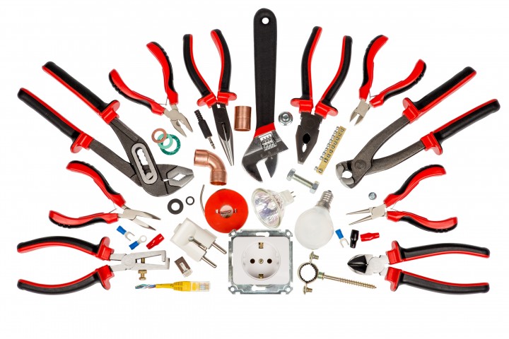 electrician and plumber tools with accessories isolated white background